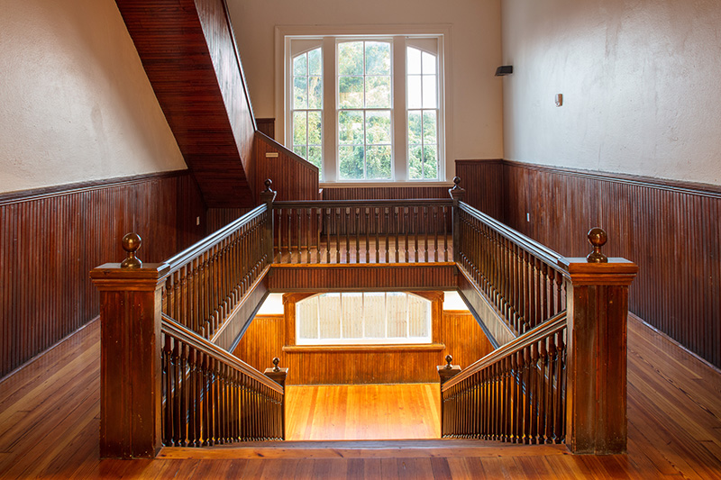 wooden stairway looking from second floor